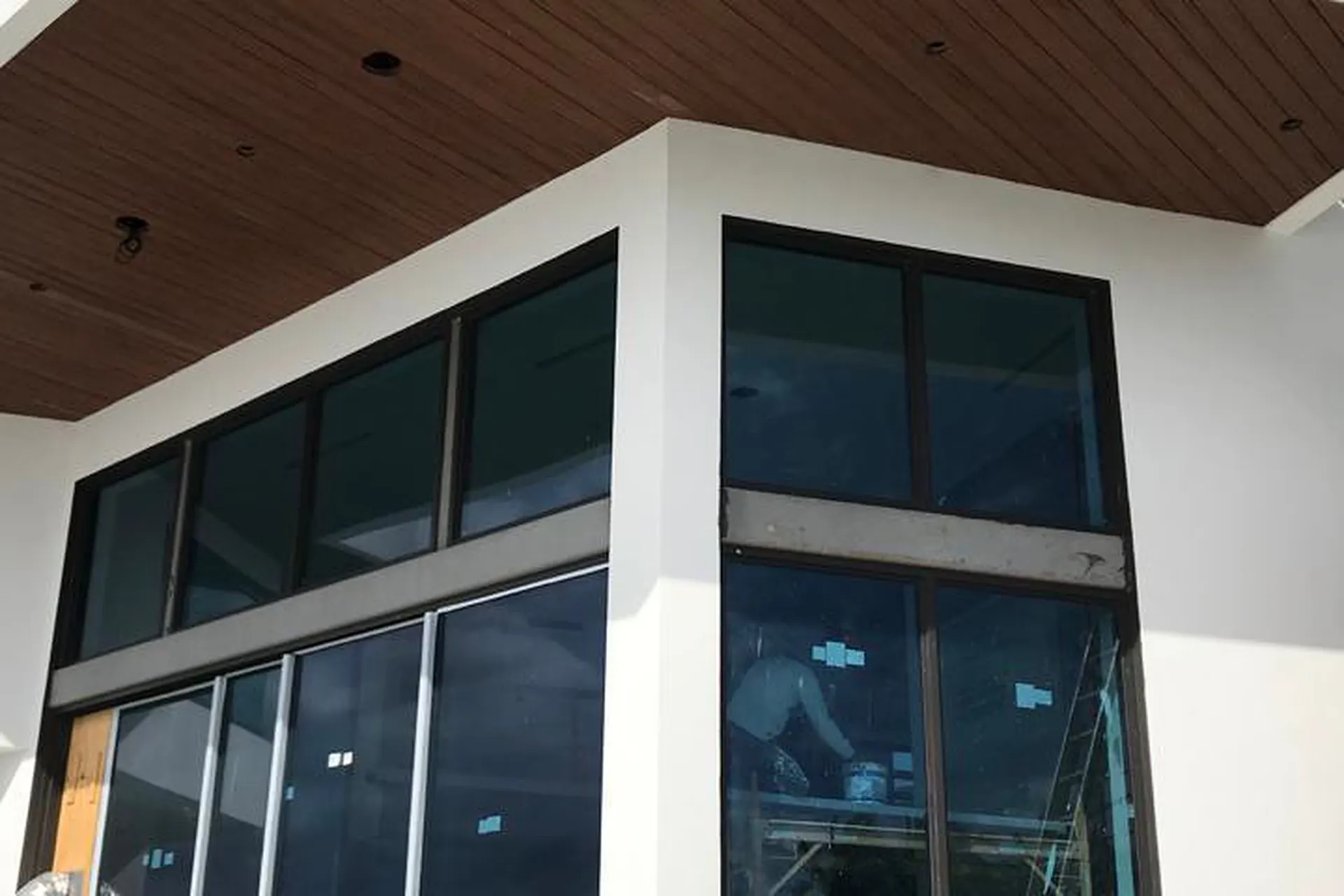 Corner of a South Florida home glazed with impact-rated windows