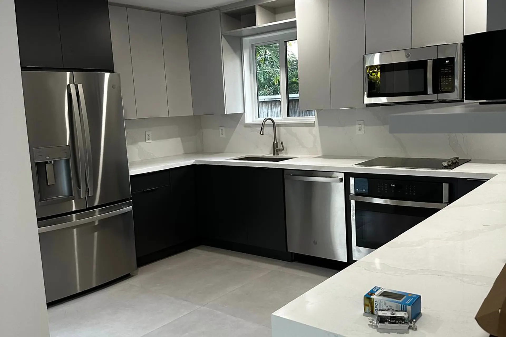 Renovated kitchen with new cabinetry and countertops